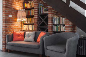A living room with a couch and chair